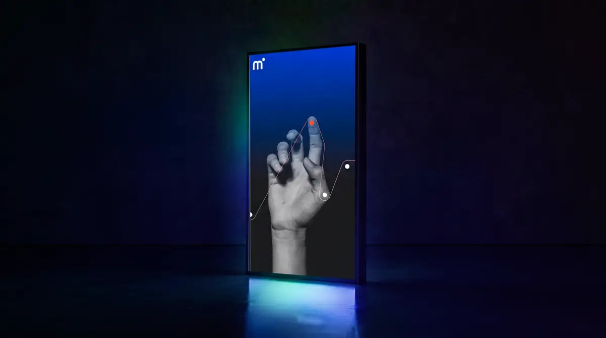 A light box in a dark room, a hand touching the configuration line